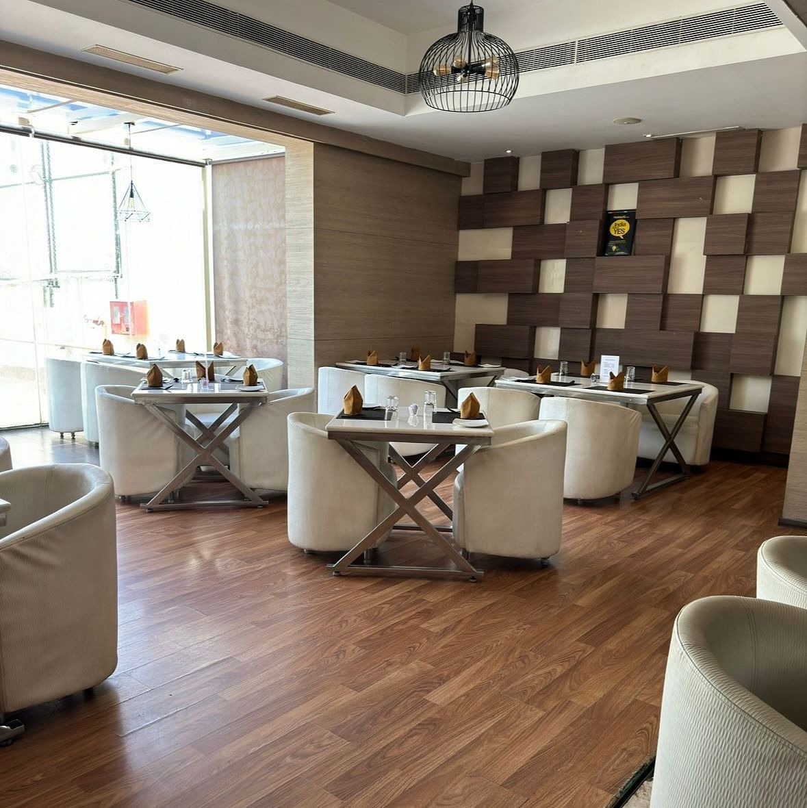 Elegant Dining Area at Cenneys Gateway with wooden flooring and contemporary decor
