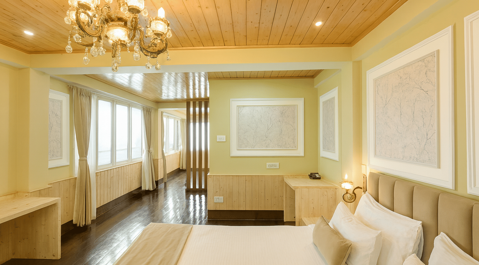 Luxury suite hotel room with chandelier, elegant wooden ceiling, large windows bringing in natural morning light, and premium 3-star interiors with forest view ambiance