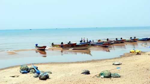 Boats queued up on the beachside, one of the scenic sights among Tharangambadi tourist places.