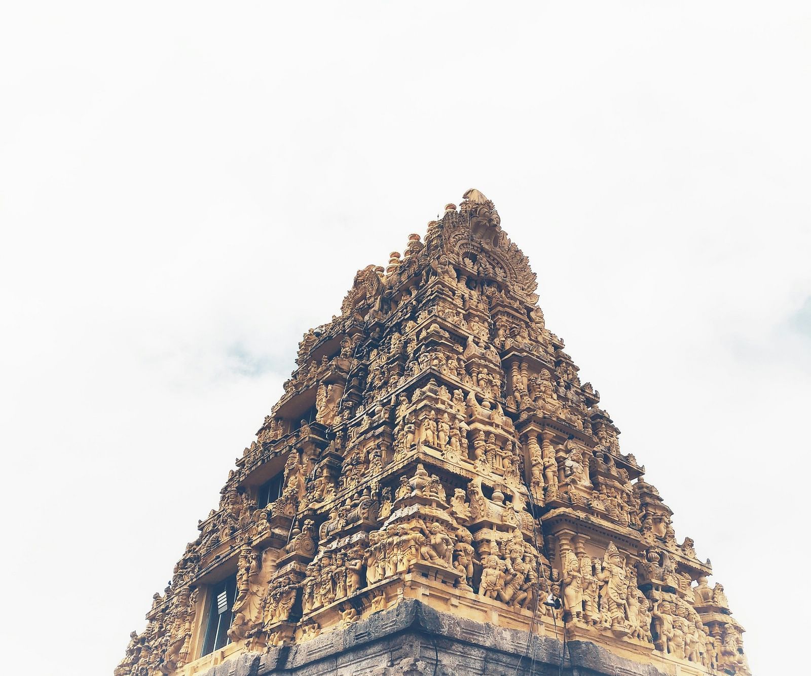 An image of a temple with sculptures 