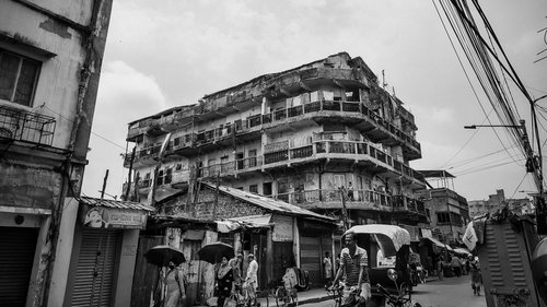 Netaji Bhavan with rickshaw on the road
