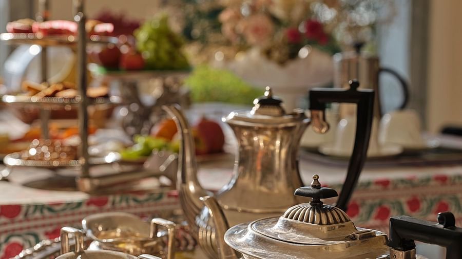 image of a plate with a fancy tea pot and cups at dev shree, deogarh