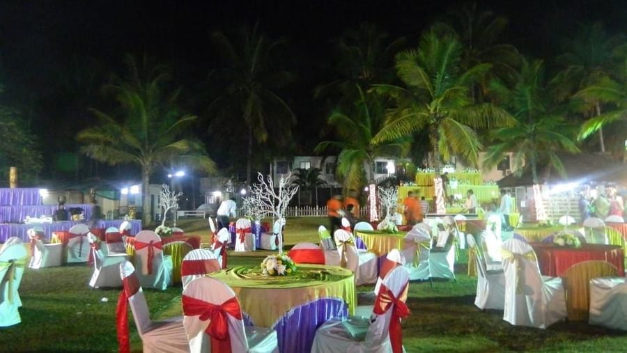 Beautifully decorated outdoor event with tables and lights at Fantasy Golf Resort.