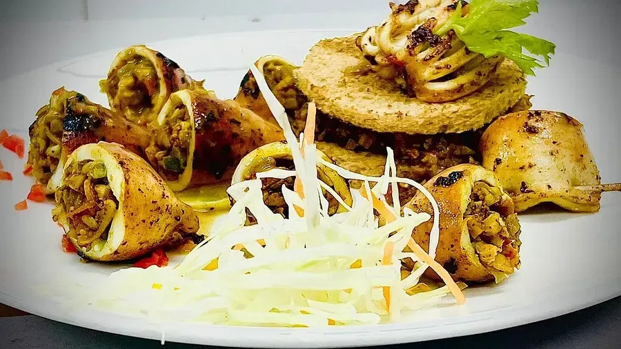 A cooked meal placed on a surface at Indie Stays Resort, Goa.