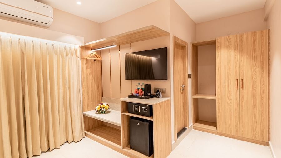 Kitchenette and wardrobe view of The Premium Rooms at Livancia The Sojourn, Bangalore.