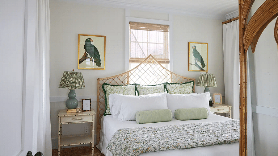Bedroom with a green and white bedspread, rattan furniture, and natural light | Abaco Inn