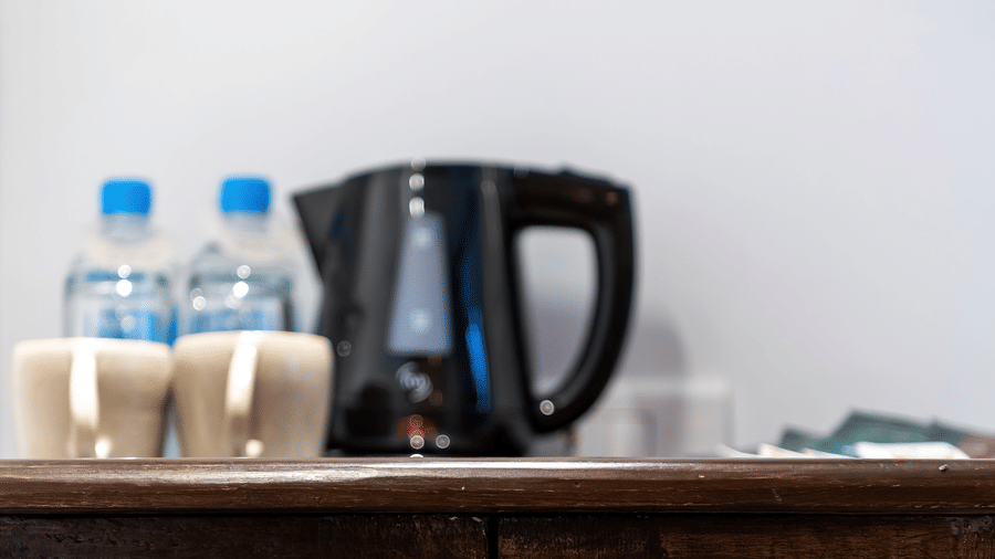 Tea coffee maker and bottled water in the Nepali Suite - The Nanee