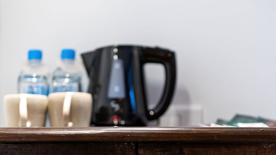 Tea coffee maker and bottled water in the Nepali Suite - The Nanee