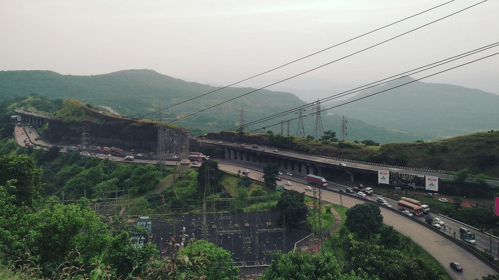 a natural scenery with hills and trees