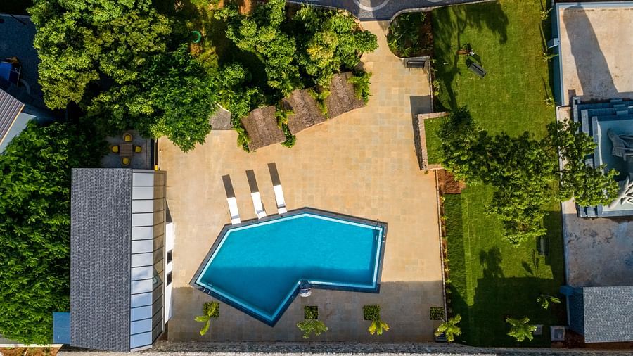aerial view image of the main swimming pool on a bright sunny day - Darza Resorts