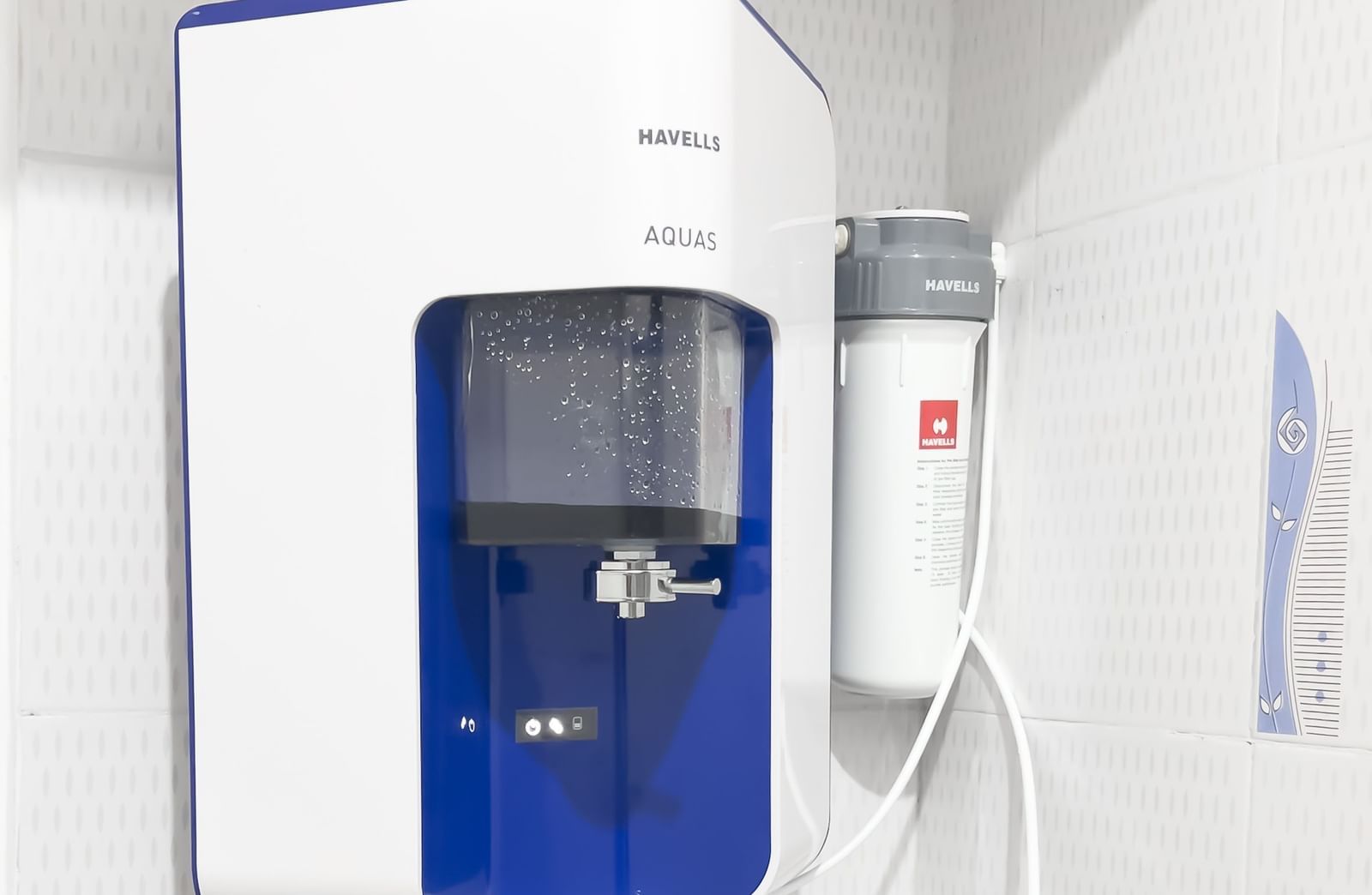 Wall-mounted water purifier in the kitchen at The Pinnacle, Electronic City.