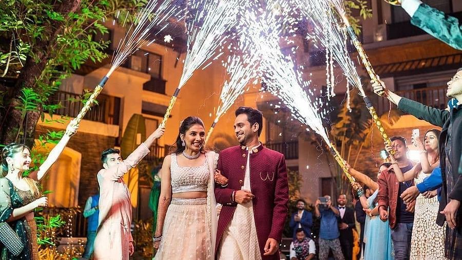 Happy couple during a wedding ceremony - Rhythm Lonavala