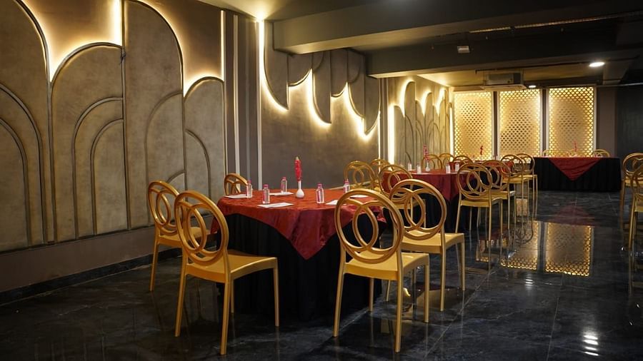 An image of Utsav Banquet hall with several chairs and table set- Bamboo Saa Mulberry Resort, Pushkar
