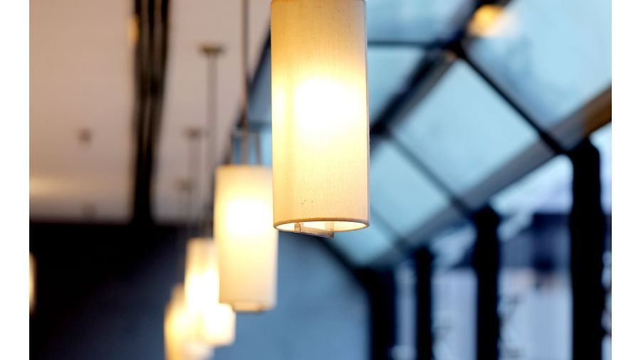 the lights hanging over each seating space at Cascades restaurant in Vizag