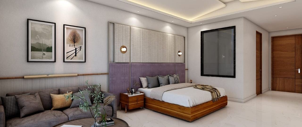 A spacious room featuring a double bed alongside a common seating area. - Namaste Corbett