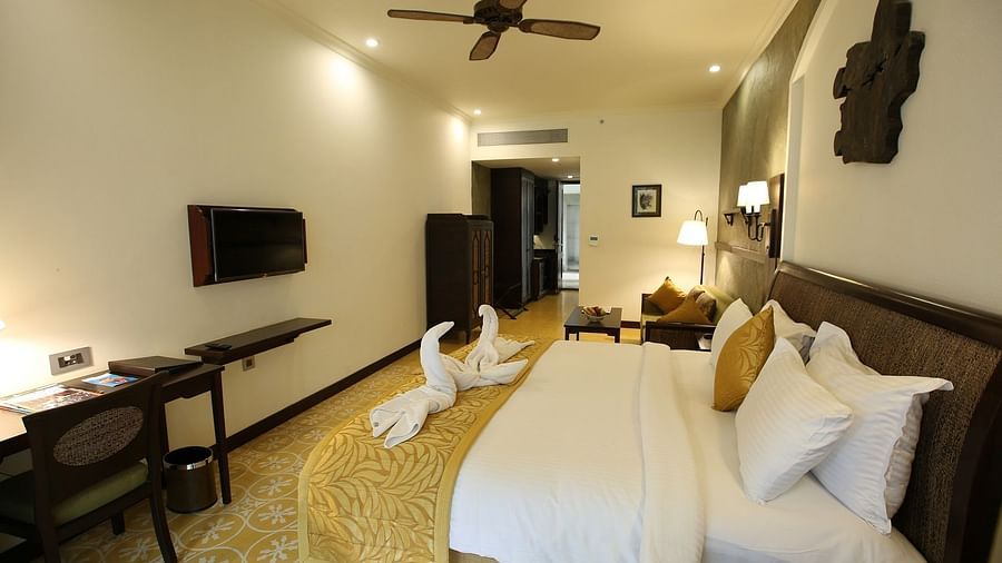 an image of a bedroom with a fan- Rhythm Lonavala