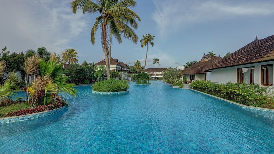 Swimming pool in the centre of a resort - Rhythm Kumarakom