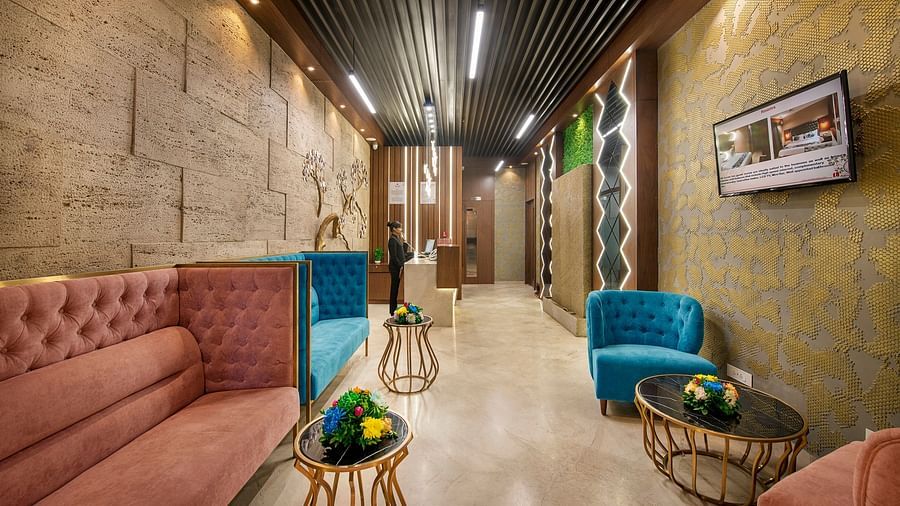 A hotel lounge area with comfortable sofas and contemporary design - SK Lords Inn Ahmedabad