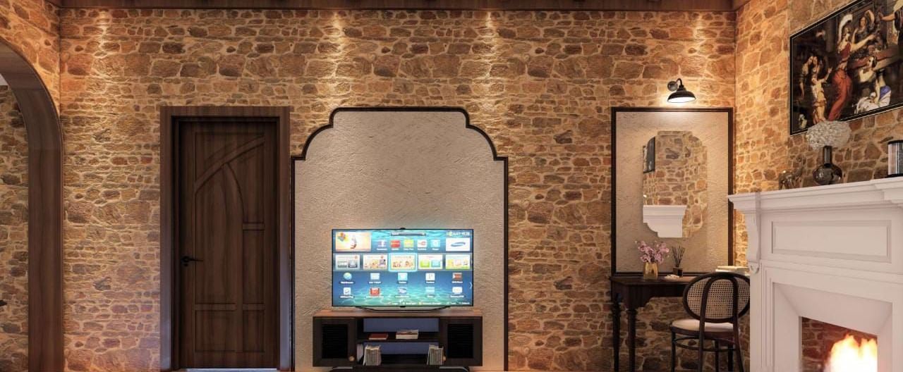 Rustic bedroom featuring a stone-clad wall, exposed timber beams, a fireplace, and a television recessed in an archway at BluSalzz Terrah Hills Resort, Dalhousie.
