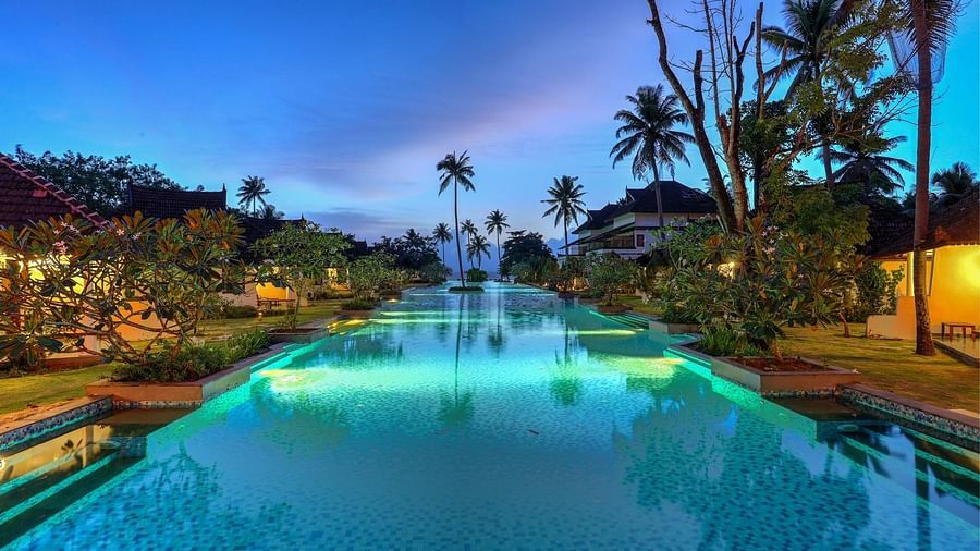 Turquoise blue waters in an infinity pool - Rhythm Kumarakom