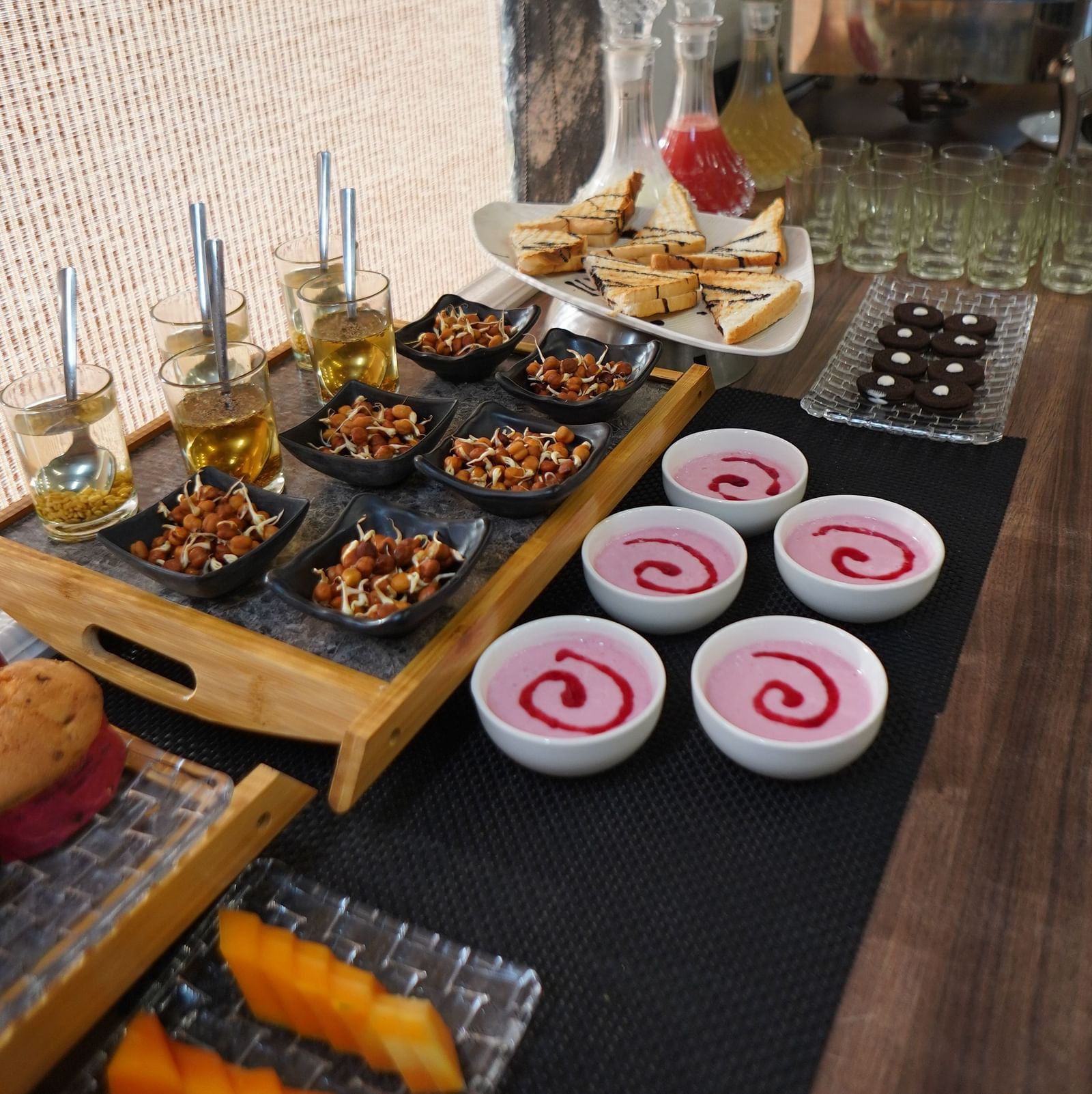 A close-up shot of a buffet table with a variety of dishes and serving utensils. - Bamboo Saa Mulberry Resort, Pushkar