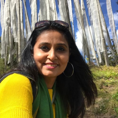 a woman posing for the picture