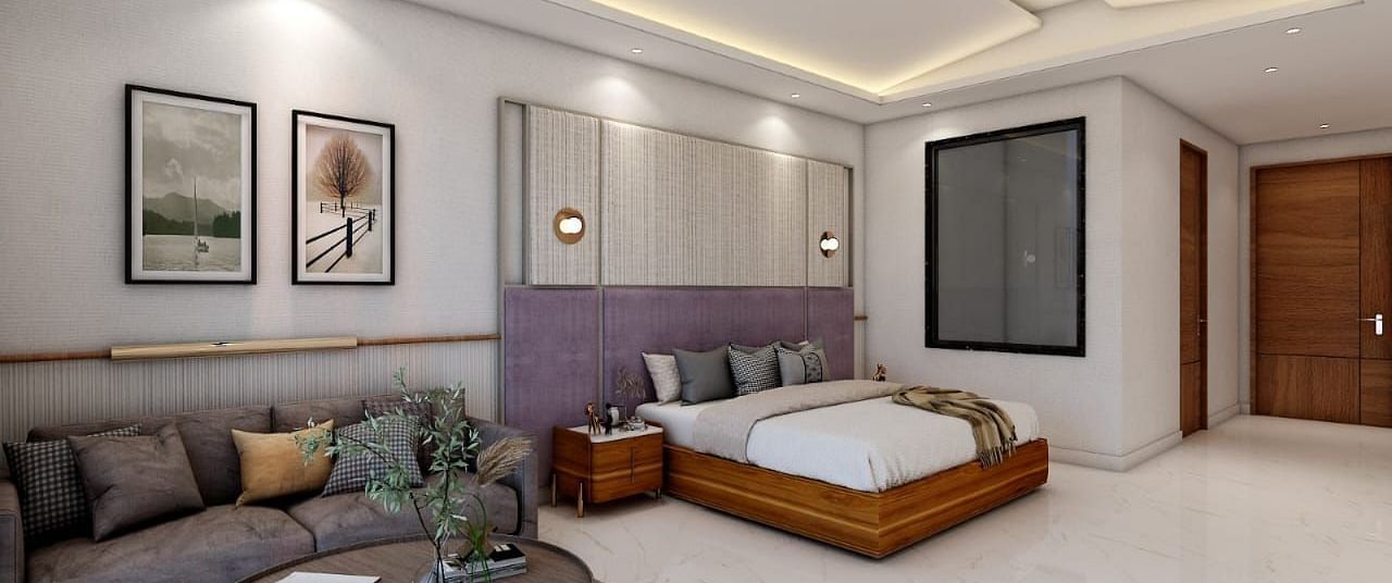 A spacious room featuring a double bed alongside a common seating area. - Namaste Corbett