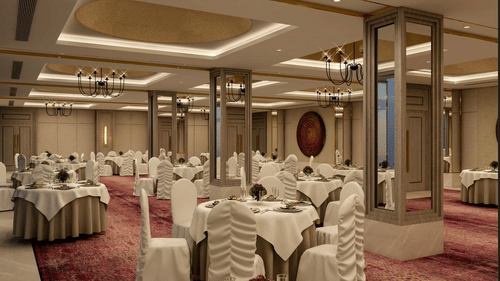 tables set up inside Aura banquet hall at Sarovar Portico Birgunj