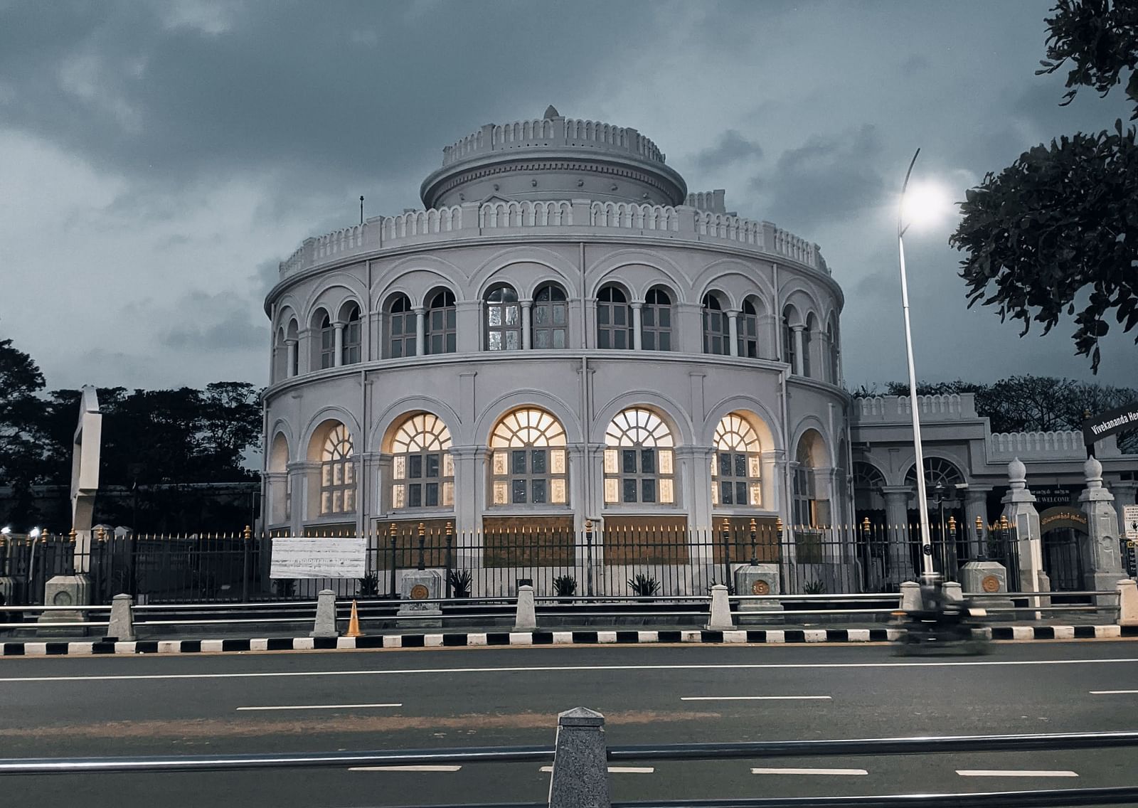An overview of Vivekananda house in Chennai with dark clouds above.