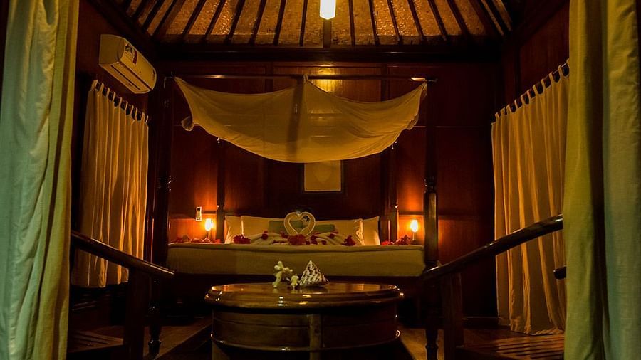 bed and sitting area in one of our rooms in Havelock