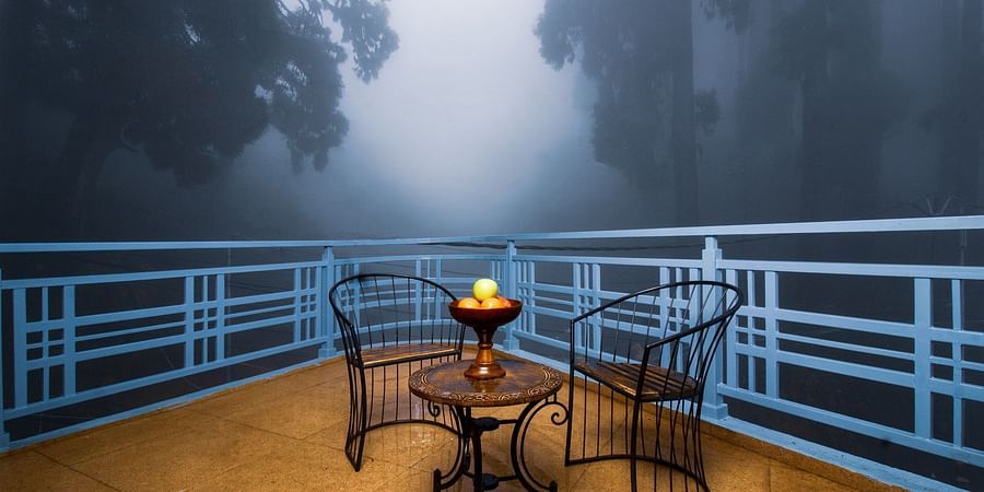 Suite With Balcony features balcony seating with two chairs and a round table at Mount Lungta Boutique Hotel & Spa
