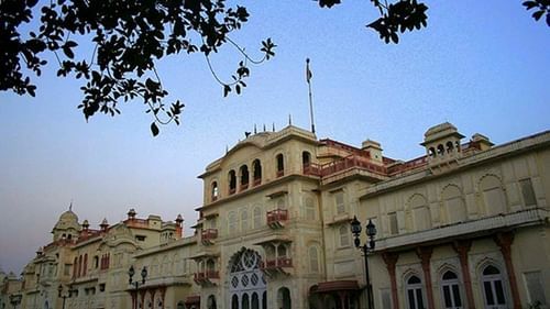 Facade of the Moti Bagh Palace and the blue sky in the background