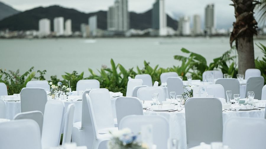 An outdoor area where table and chairs are placed - Alibu Resort Nha Trang