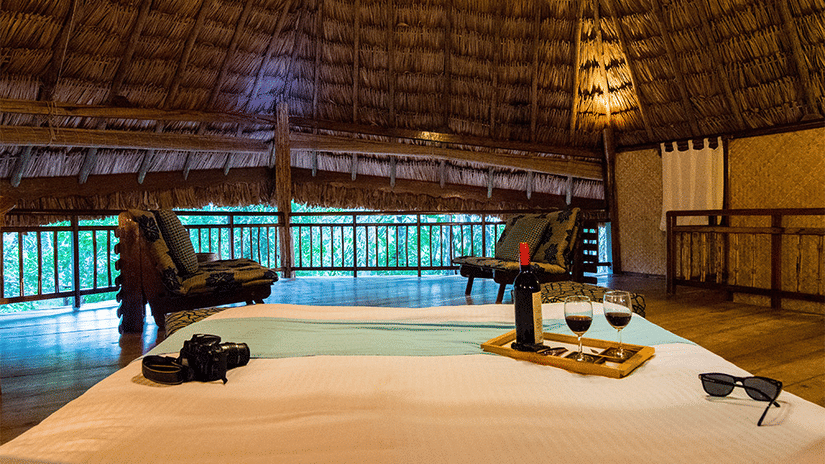 Lounging area in one of the Fan-cooled Duplex Cottages at Barefoot at Havelock.