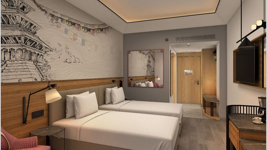 twin beds and amenities inside a Deluxe Twin room at Sarovar Portico Birgunj