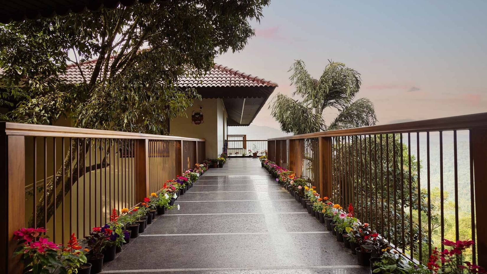Pathway with flowers at Golak by Denissons Presidential Villa, Madikeri