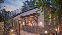 cooks preparing food in a small building - The Golden tusk