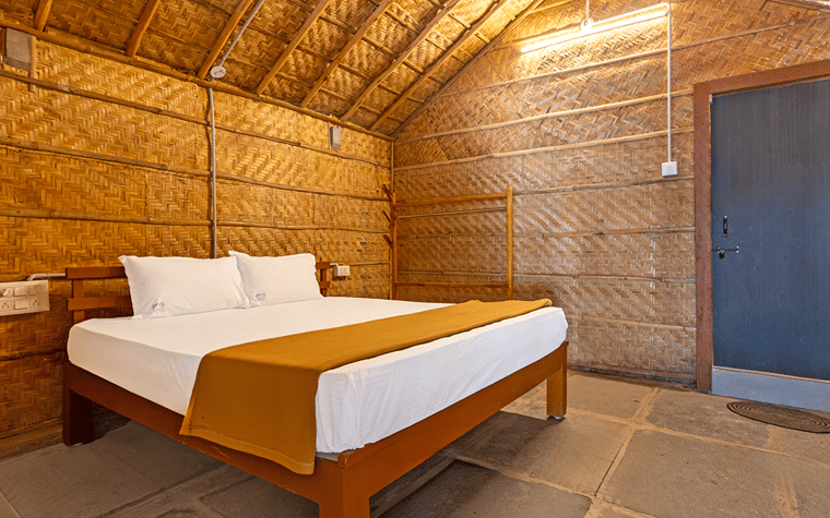 A bamboo cottage in the landscaped grounds