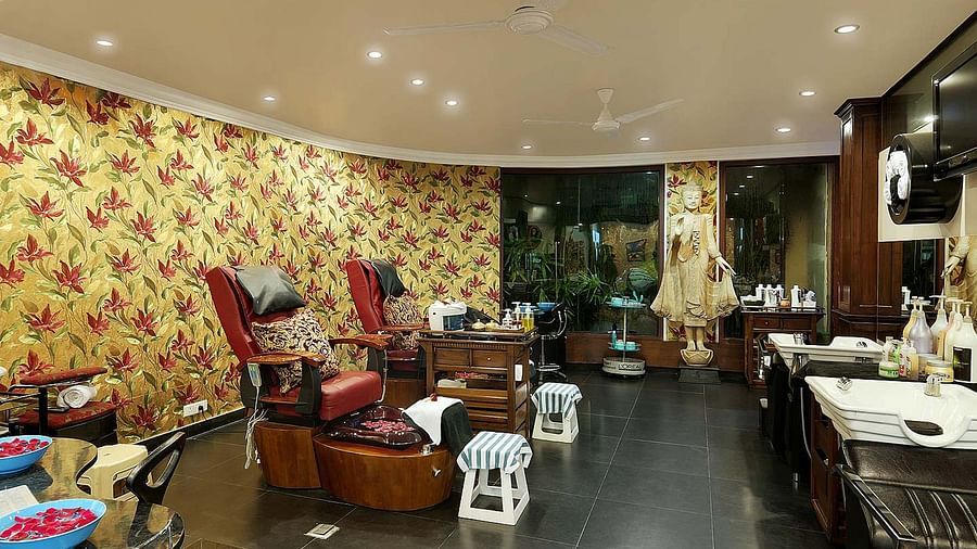 salon rotating chairs with pedicure sinks below them - Mayfair Lagoon, Bhubaneswar