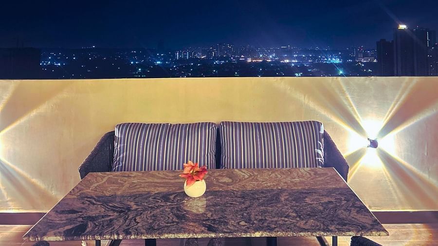 Seating arrangements on the rooftop - Outdoor Sunset Flagship - Rhythm Gurugram