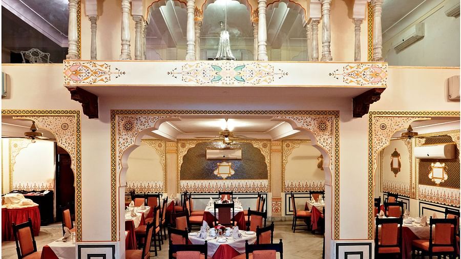 Indoor seating arrangements inside anada restaurant - Mandawa Haveli, Jaipur
