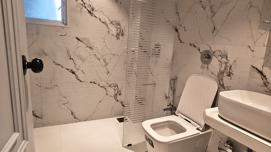 Contemporary bathroom with modern fittings at Home2 Residency, Mumbai Airport