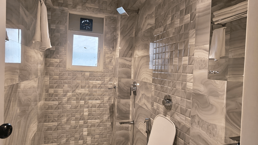 Contemporary bathroom with shower area at Home2 Residency, Mumbai Airport