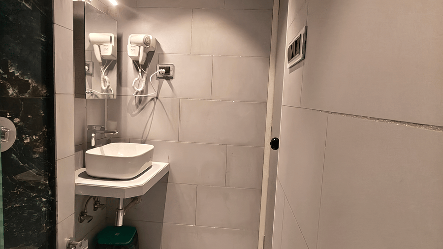 Elegant bathroom with modern interiors at Home2 Residency, Mumbai Airport