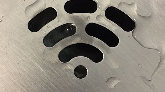 wi-fi symbol against an opaque glass - V Five Hotel