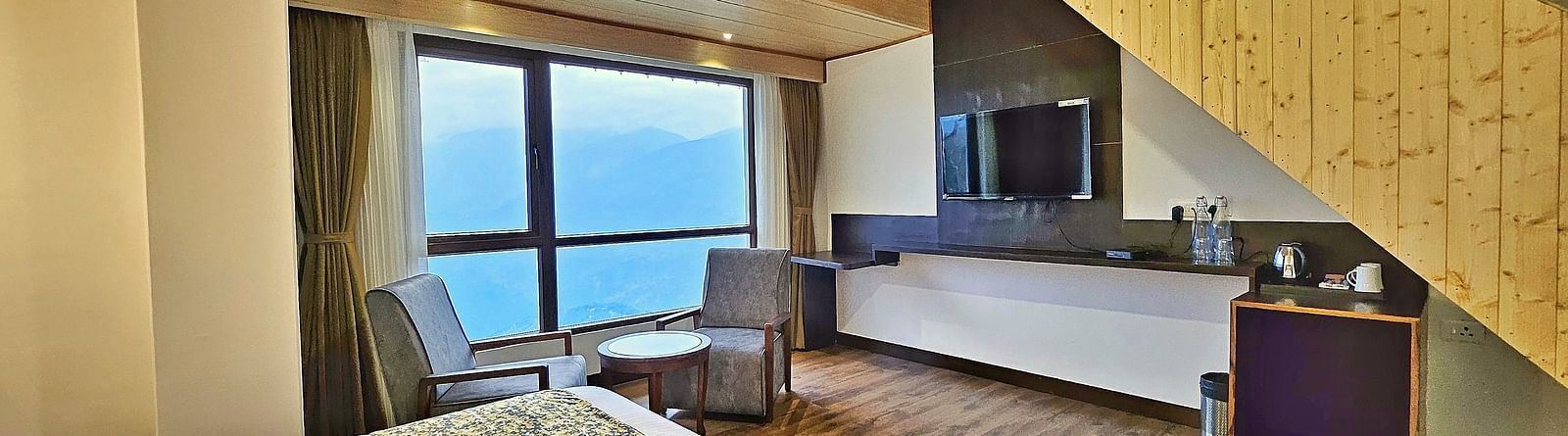 view of a king size bed of Attic Family Suite at Sumitel Pelling, Geyzing