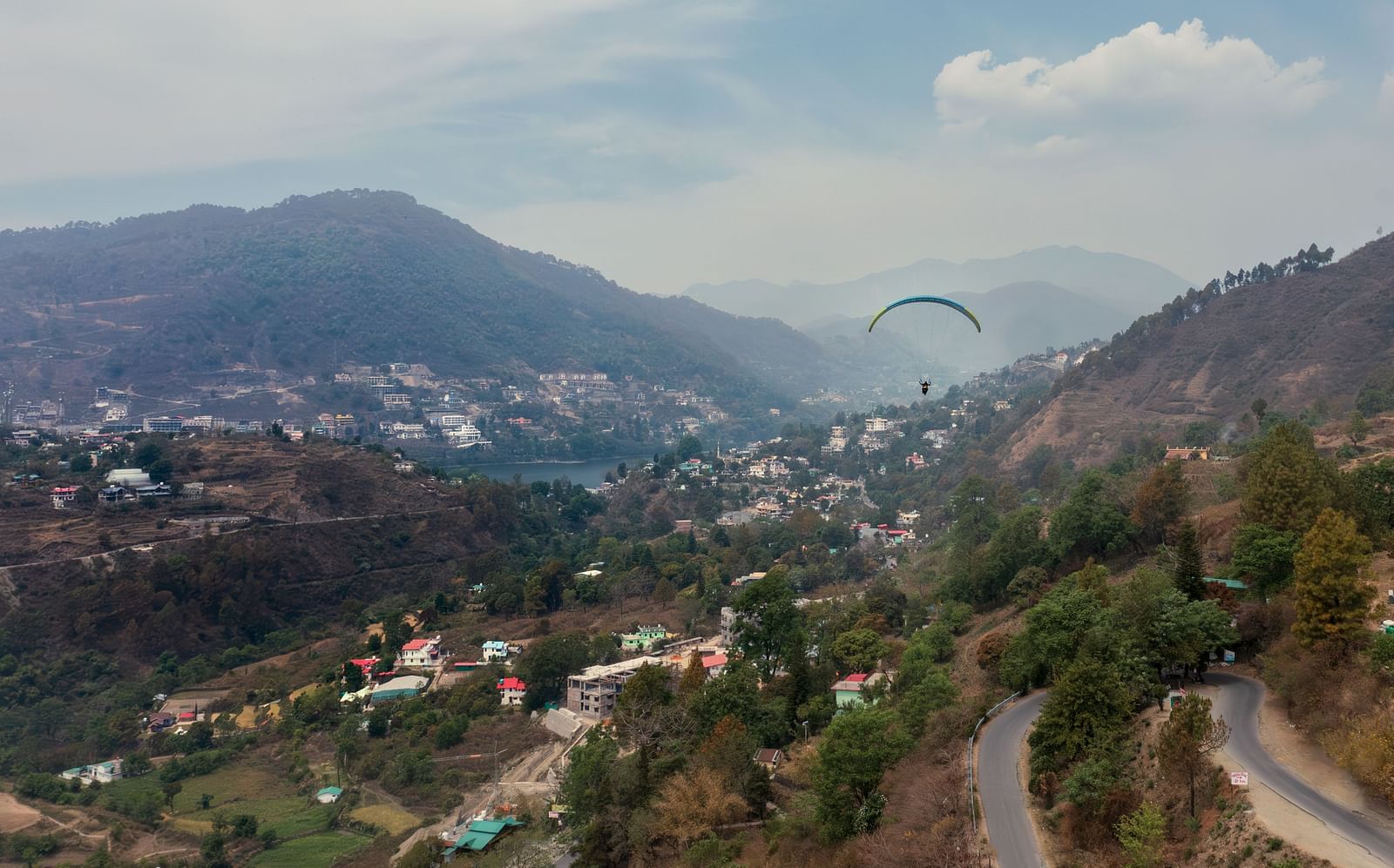 a view of the hills with buildings spread across at Mountoria Retreat, Naukuchiatal
