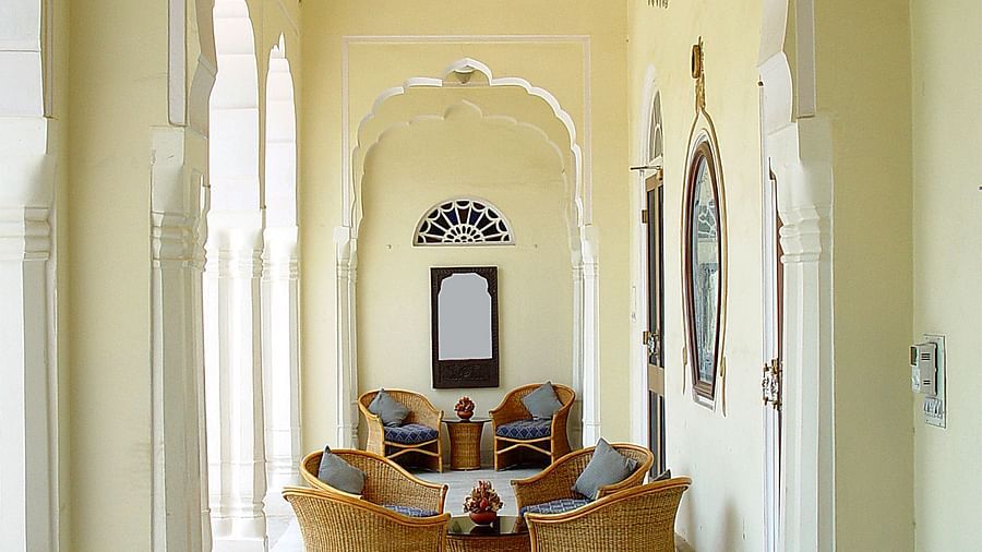 Single seater sofas with tables in front of it in the Veranda- Mandawa Haveli Jaipur