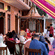 An event space with several people performing rituals. | Hotel Devnadi, Haridwar