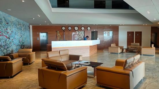 A picture of a waiting lounge furnished with comfortable sofas 